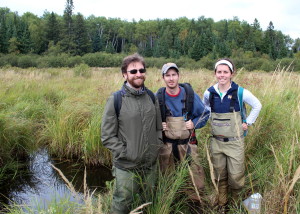 Standing next to a pool where fish were seen swimming, from let to right: Patrick Shirey, Nathan Evans, Kelly Heilman