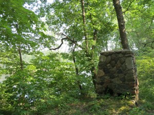 Old stone fireplace still standing at the landing
