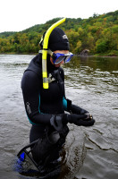 Biologist Elissa Buttermore, holds a monkeyface mussel.