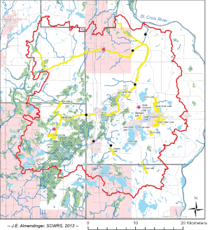 The watershed (red boundary) of the Sunrise River, a major tributary to the St. Croix on the Minnesota side, showing impaired waters (river segments and lakes) in yellow.  Many of these impairments are related to excess phosphorus.  