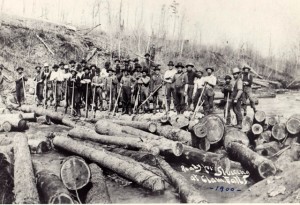 River Pigs pose for a photo  on the Clam River in Burnett County, (Thomas St. Angelo Library - Cumberland, Conners Collection)