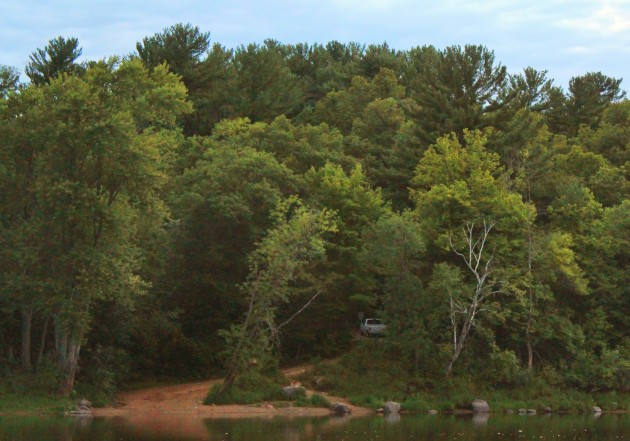 Log House Landing from across the river at twilight