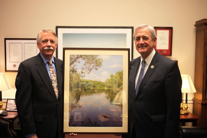 National Park Service director Jon Jarvis (left) presents a photo of the St. Croix River to Minnesota Representative Rick Nolan.