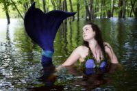 Mermaid swims the St. Croix to share the wonders of water