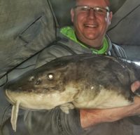 Watch an ice fisherman catch a 120-pound sturgeon on the St. Croix