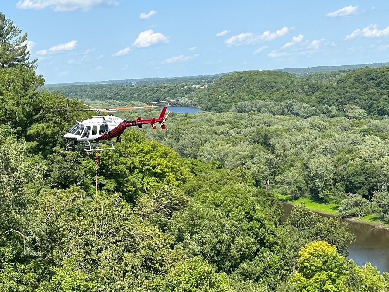 Helicopters help rescue man after fall down St. Croix River bluff