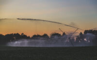 St. Croix watershed enters drought warning phase in Minnesota Farmland Sunset - Crop Irrigation System - Wisconsin
